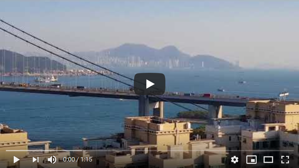  An OOCL container vessel passing under the Tsing Ma Bridge on a very clear day in Hong Kong last week. I took this video from the balcony of an apartment on Park Island, one of the few islands in Hong Kong where cars are not allowed.
